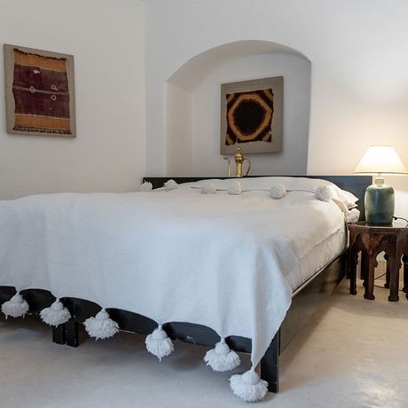 Cadi Boutique Hotel Einfaches Doppelzimmer Doppelbett Blick auf ein Doppelbett